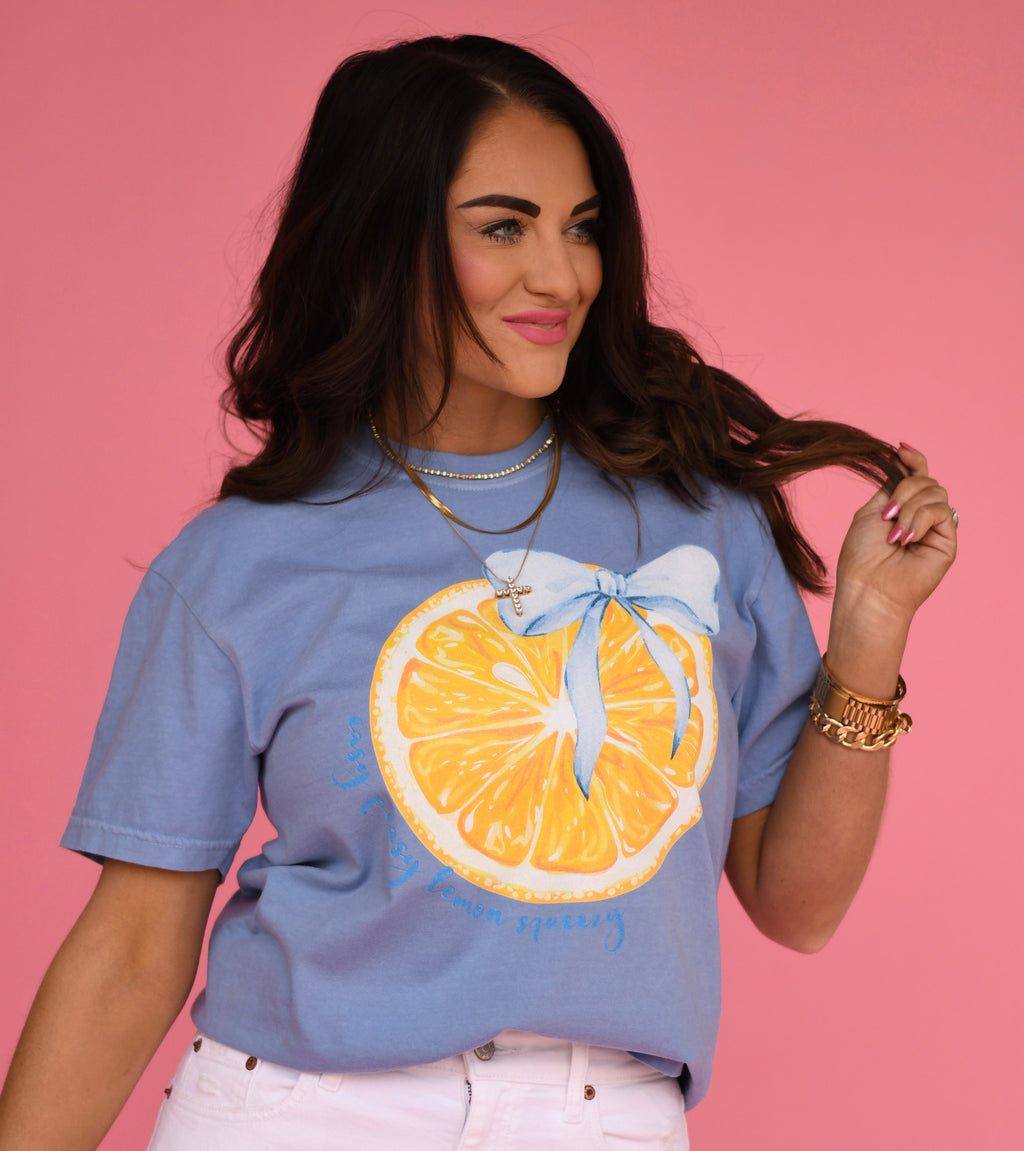Yellow Lemon Bow Tee from P&PD Wholesale, featuring a playful lemon bow design on a casual t-shirt.