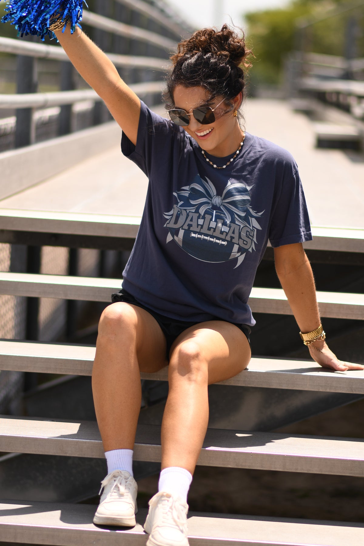 Navy Dallas Football Bow Tee from P&PD Wholesale, featuring a stylish bow detail and casual fit for fans.