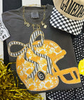 Gold floral helmet tee by P&PD Wholesale, featuring a vibrant floral design on a casual gold-colored T-shirt.