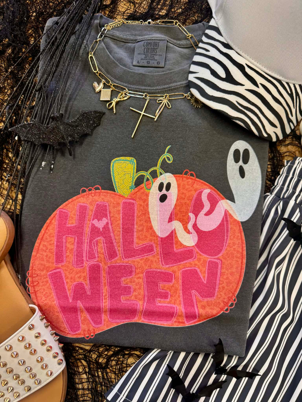 Halloween Ghosts and Leopard Pumpkin T-shirt from P&PD Wholesale, featuring spooky ghost and leopard pumpkin graphic on a casual tee.