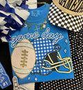 Blue gingham helmet tee by P&PD Wholesale, featuring a game day design, ideal for fans and casual wear.