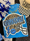 Blue Gameday Leopard Helmet T-shirt by P&PD Wholesale featuring a sporty helmet graphic on a casual tee.