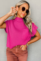 Shewin oatmeal patch pocket ribbed knit short sleeve sweater, close-up of beige knit fabric with patch pocket detail.