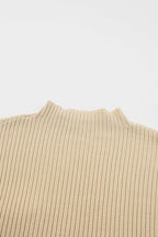 Shewin oatmeal ribbed knit short sleeve sweater with patch pocket, casual and comfortable design, in a soft oatmeal color.
