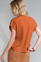 Shewin oatmeal patch pocket ribbed knit short sleeve sweater, close-up of front detail showing cozy knit texture and casual style.