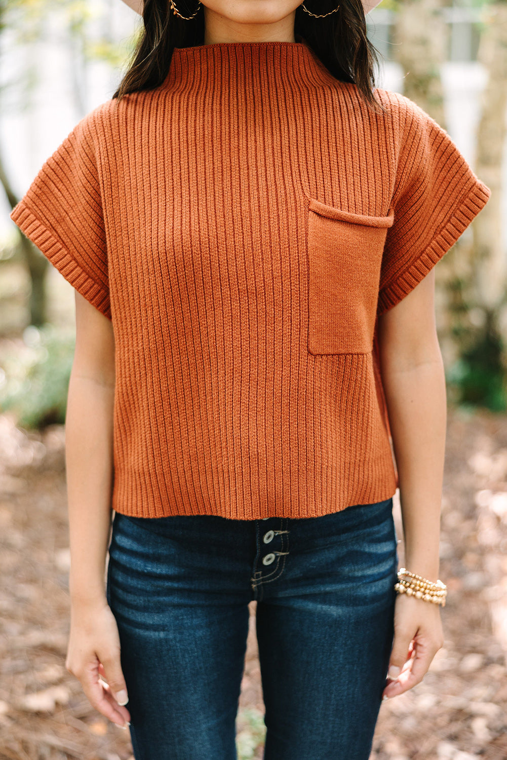 Oatmeal patch pocket ribbed knit short sleeve sweater by Shewin, featuring a cozy textured fabric and classic crew neckline.