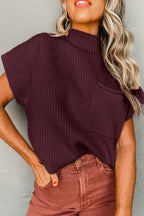 Shewin oatmeal patch pocket ribbed knit short sleeve sweater, close-up of the beige knit fabric with patch pocket detail.