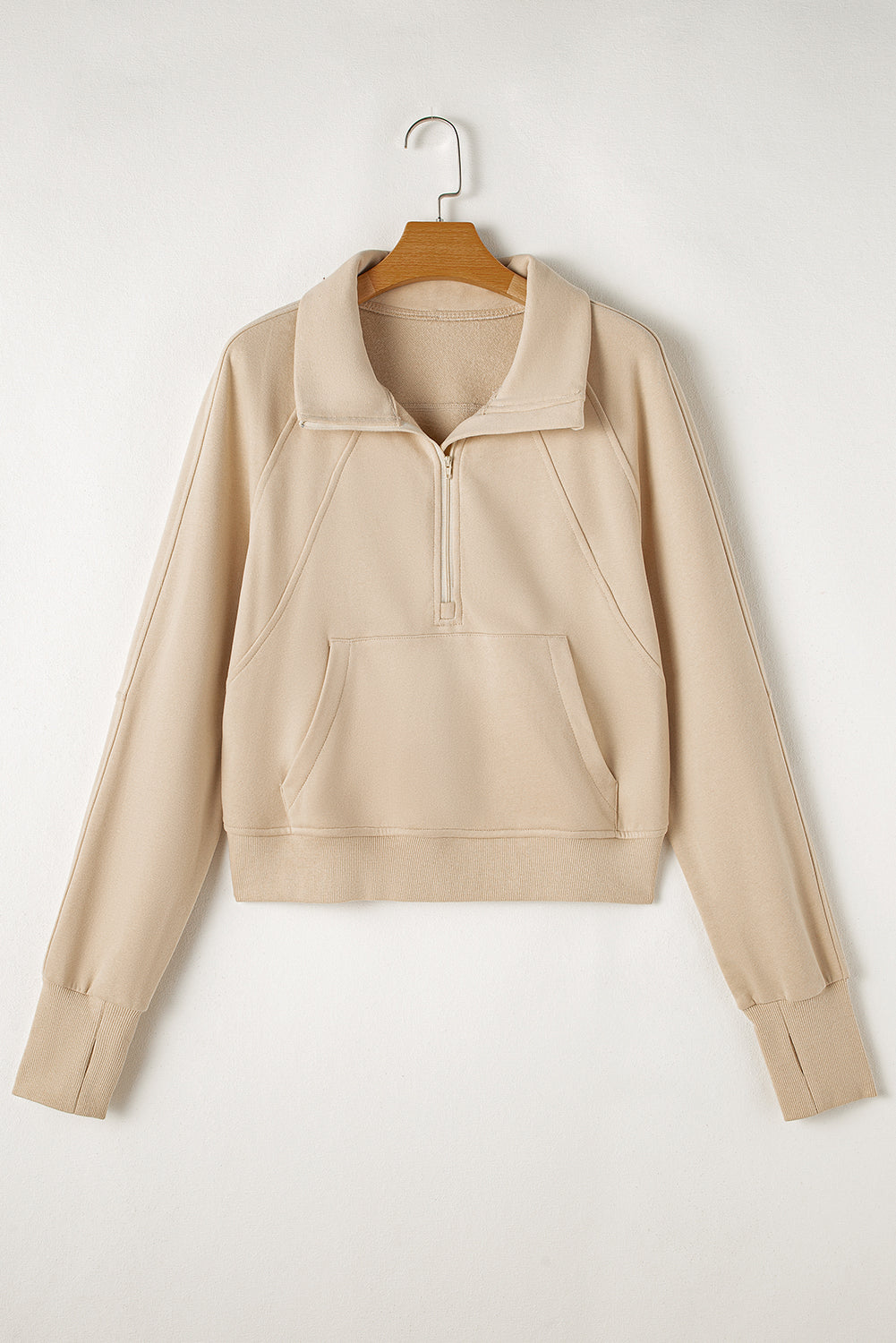 Brown zip-up stand collar sweatshirt with thumbhole sleeves from Shewin, featuring a cozy, casual design for comfortable wear.