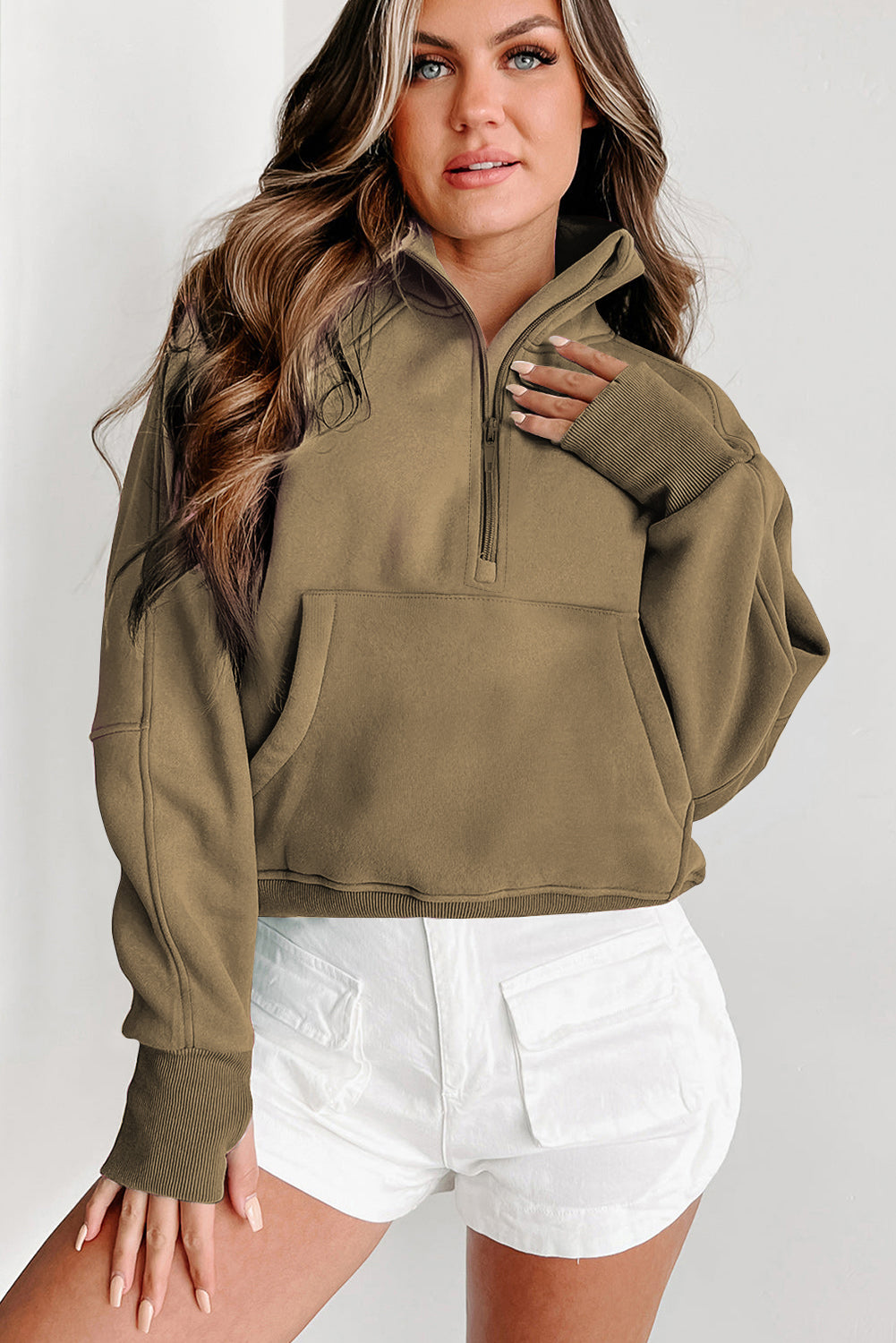 Brown zip-up sweatshirt with stand collar and thumbhole sleeves by Shewin, featuring a comfortable fit and casual style.