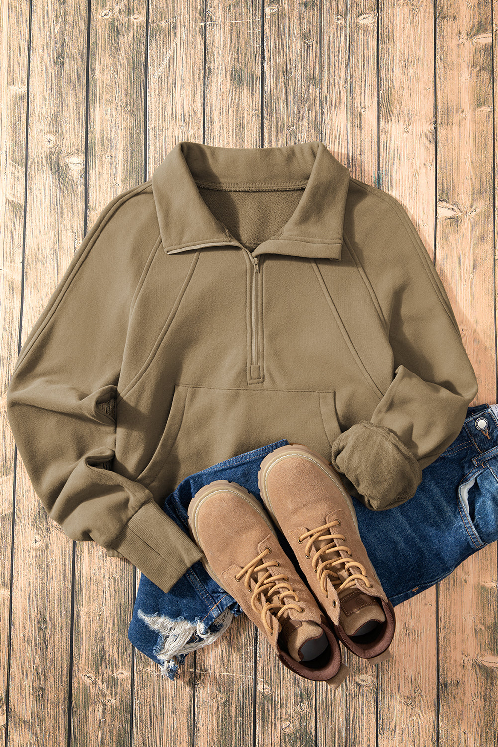 Brown zip-up sweatshirt with stand collar and thumbhole sleeves by Shewin, casual and comfortable for everyday wear.