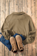 Brown zip-up sweatshirt with stand collar and thumbhole sleeves by Shewin, casual and cozy for everyday wear.
