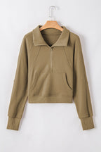 Brown zip-up sweatshirt with stand collar and thumbhole sleeves, casual Shewin hoodie for a stylish, comfortable look.