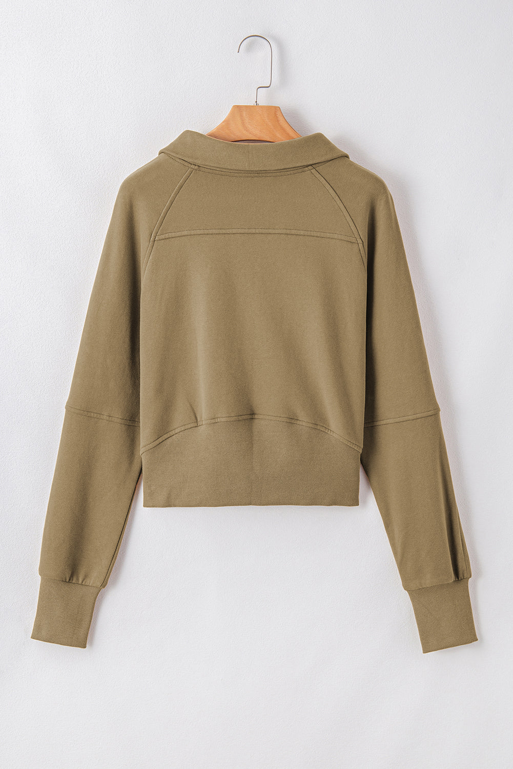 Brown zip-up sweatshirt by Shewin with stand collar and thumbhole sleeves, casual and comfortable for everyday wear.