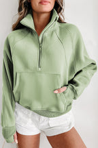 Brown zip-up sweatshirt with stand collar and thumbhole sleeves by Shewin, casual and comfortable for everyday wear
