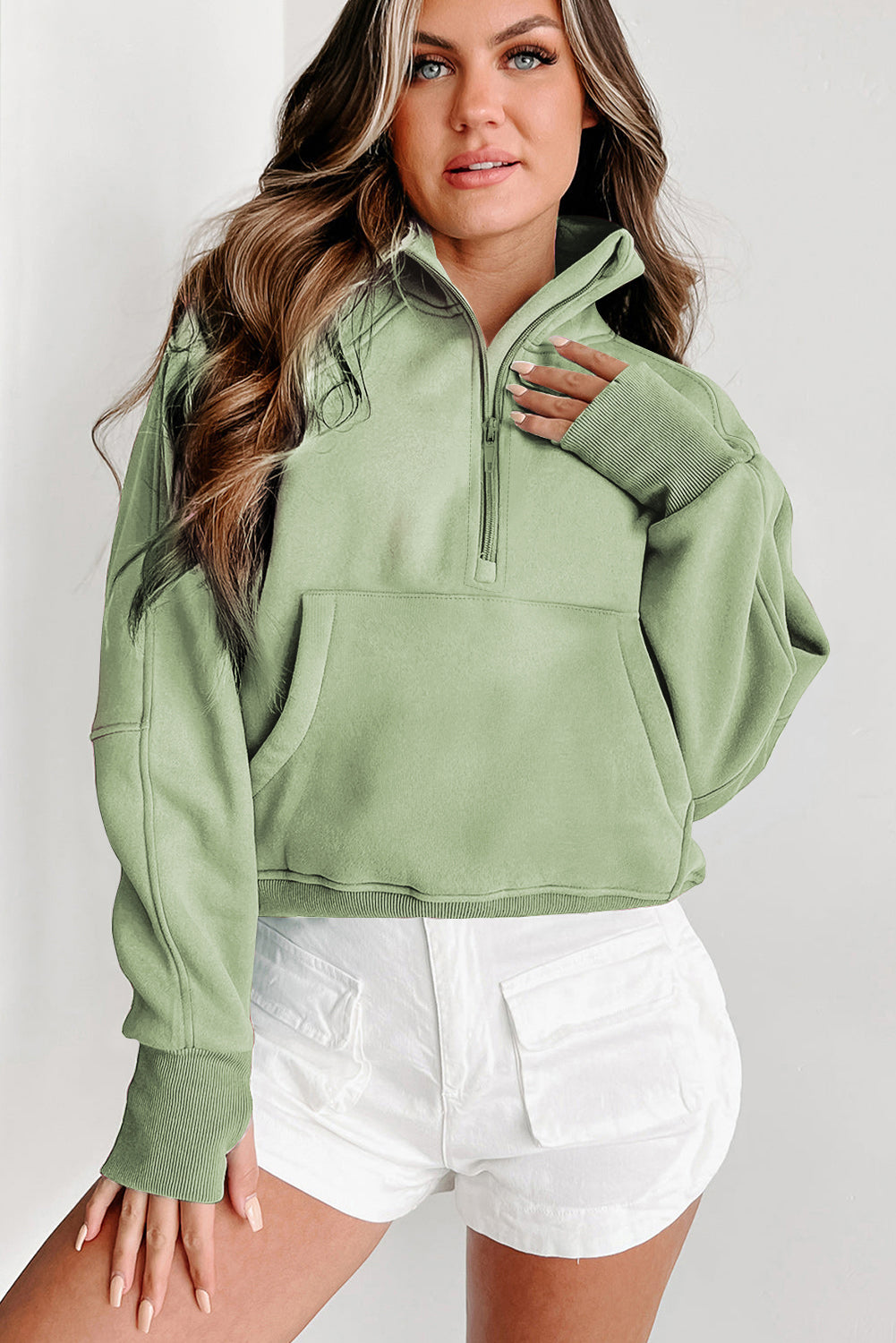 Brown zip-up sweatshirt with stand collar and thumbhole sleeves from Shewin, casual and comfortable for everyday wear.