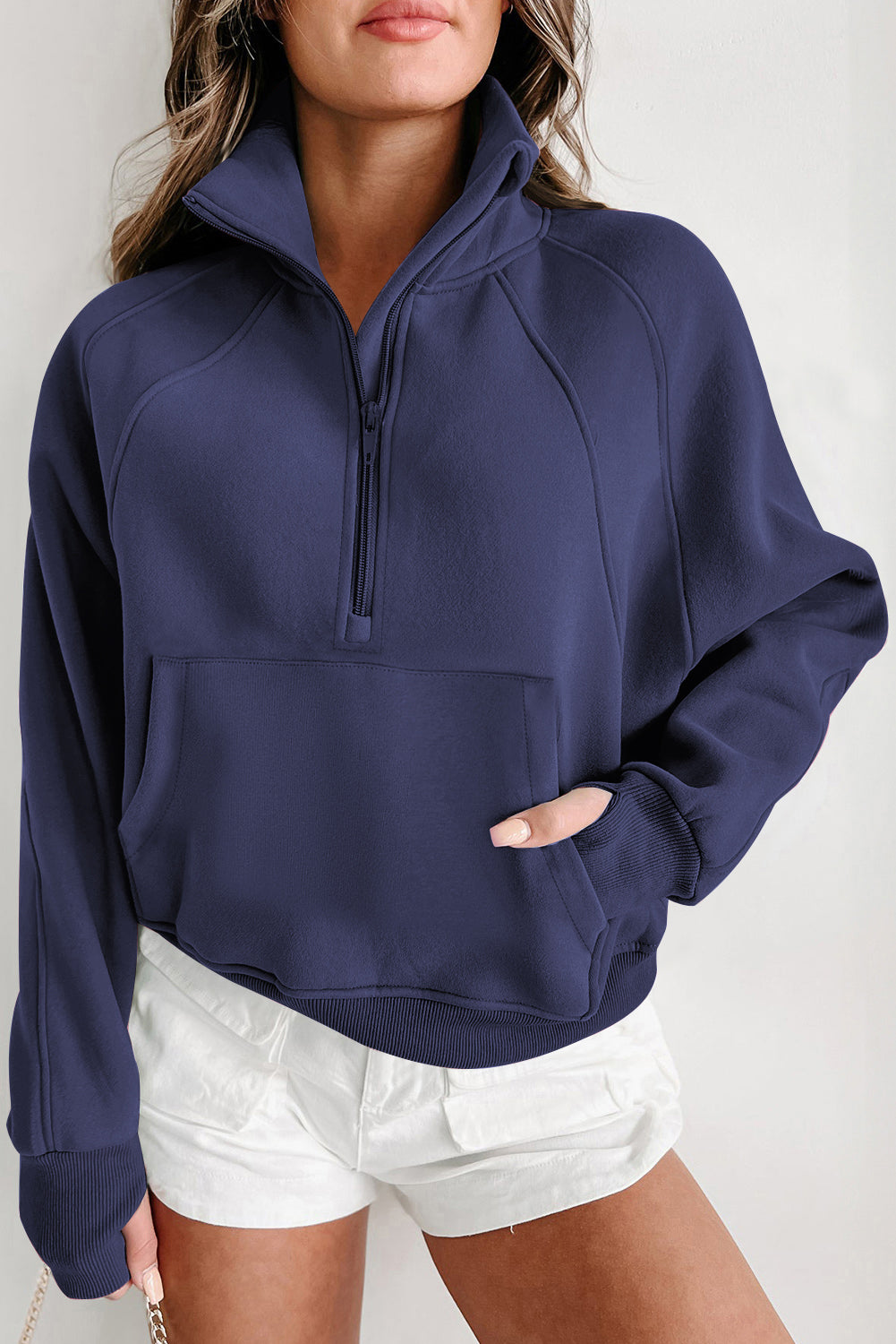 Brown zip-up sweatshirt with stand collar and thumbhole sleeves by Shewin, casual and comfortable for everyday wear