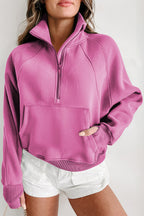 Brown zip-up sweatshirt with stand collar and thumbhole sleeves by Shewin, casual and comfortable for everyday wear.