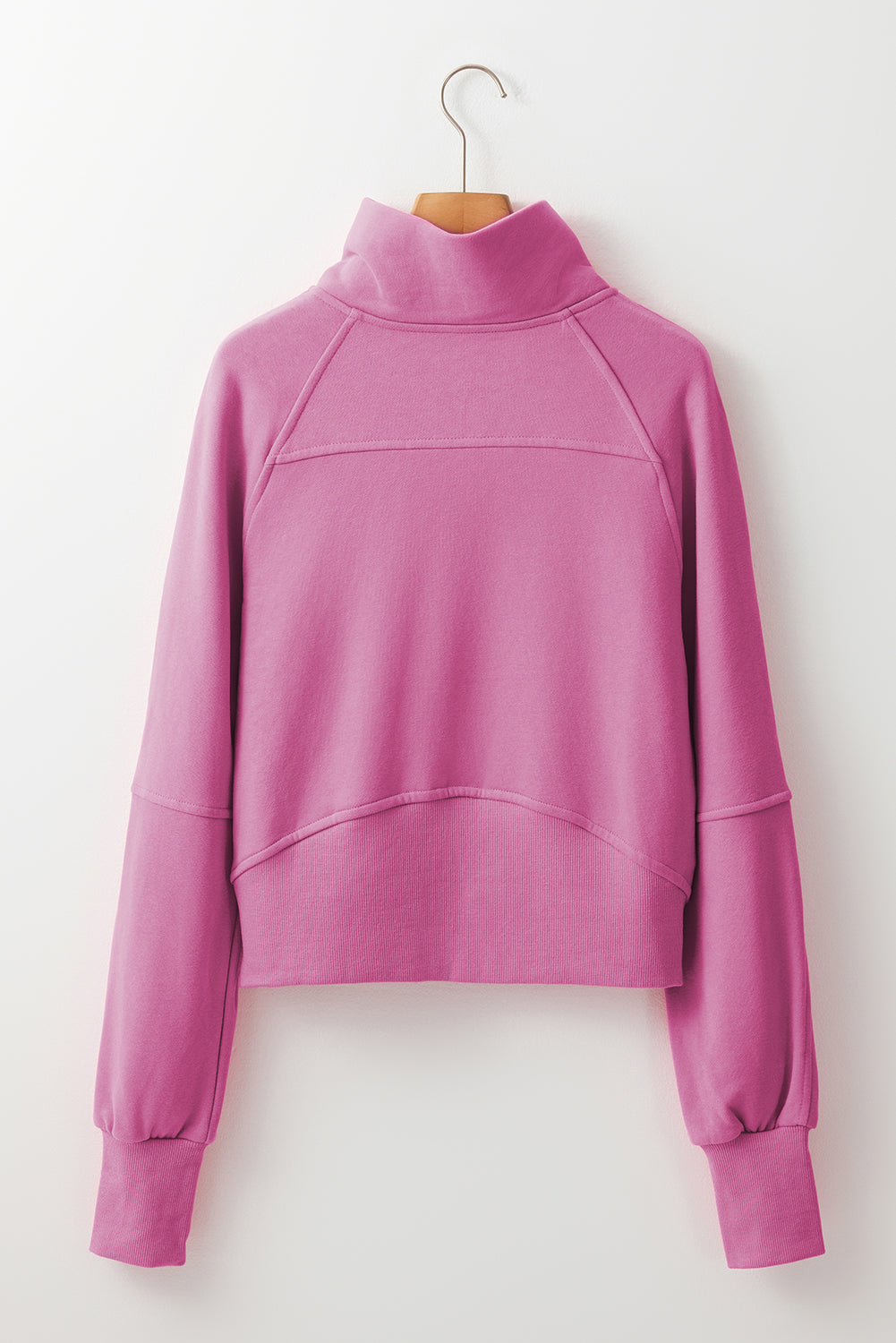 Brown zip-up sweatshirt by Shewin with stand collar and thumbhole sleeves, casual and comfortable for everyday wear.