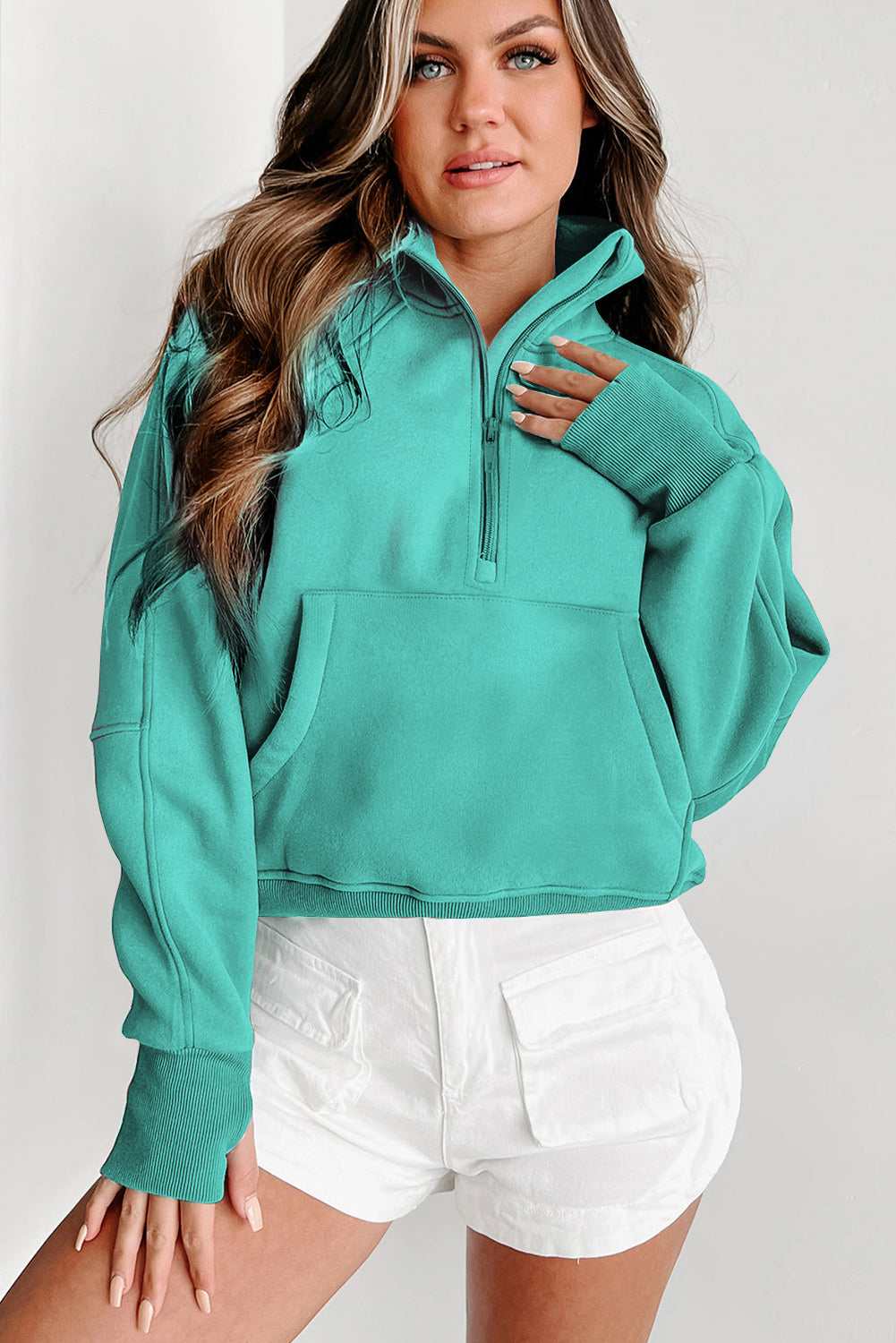 Brown zip-up stand collar sweatshirt with thumbhole sleeves by Shewin, casual and comfortable sweatshirt for everyday wear.