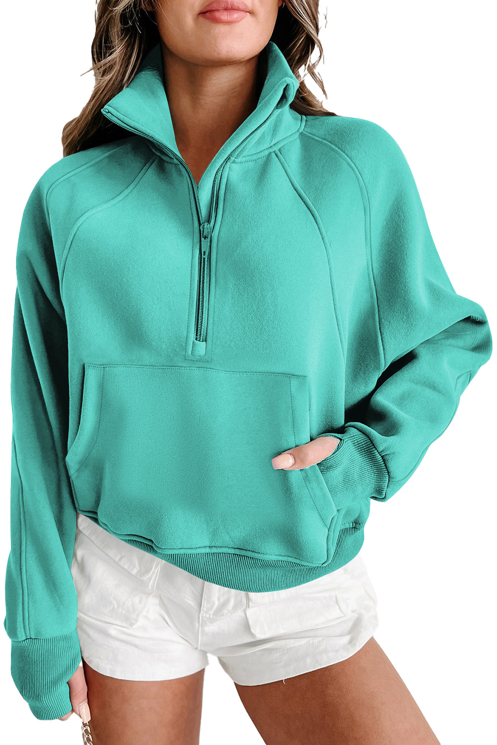 Brown zip-up sweatshirt with stand collar and thumbhole sleeves by Shewin, casual long-sleeve hoodie for women.