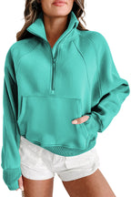 Brown zip-up sweatshirt with stand collar and thumbhole sleeves by Shewin, casual long-sleeve hoodie for women.