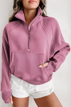 Brown zip-up sweatshirt with stand collar and thumbhole sleeves by Shewin, featuring a casual and comfortable fit.