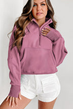 Brown zip-up sweatshirt with stand collar and thumbhole sleeves by Shewin, casual and comfortable for everyday wear.