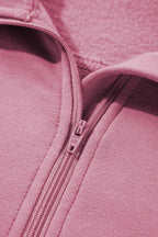 Brown zip-up sweatshirt with stand collar and thumbhole sleeves by Shewin, casual and comfortable for everyday wear.