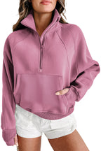 Brown zip-up sweatshirt with stand collar and thumbhole sleeves by Shewin, casual and comfortable for everyday wear.