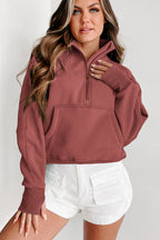 Brown zip-up sweatshirt with stand collar and thumbhole sleeves from Shewin, casual and comfortable for everyday wear.