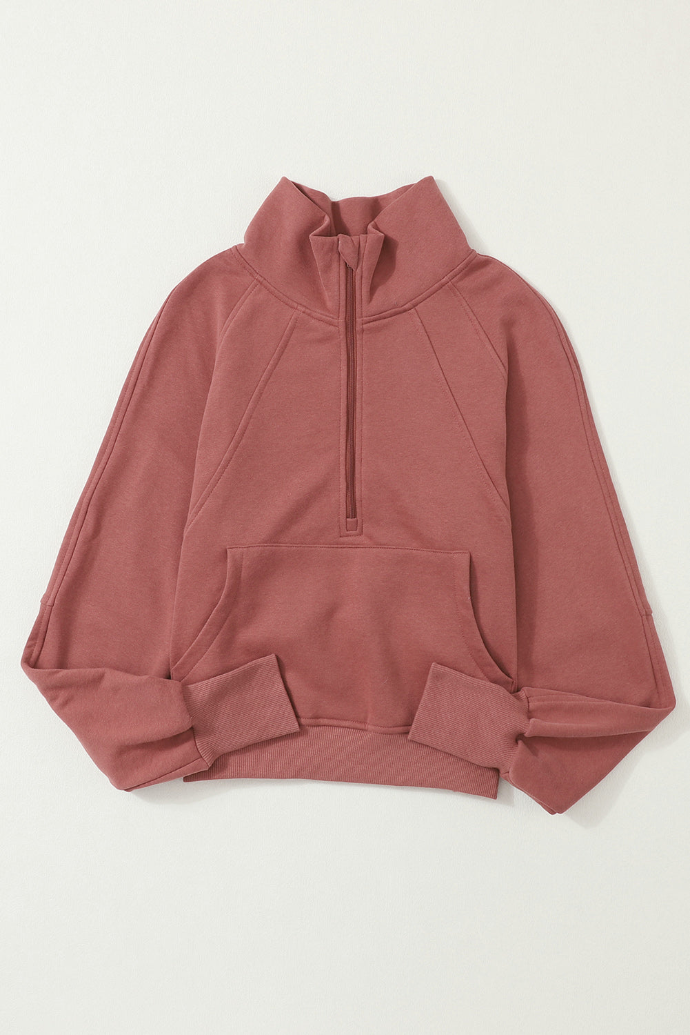 Brown zip-up sweatshirt with stand collar and thumbhole sleeves by Shewin, casual and comfortable for everyday wear.