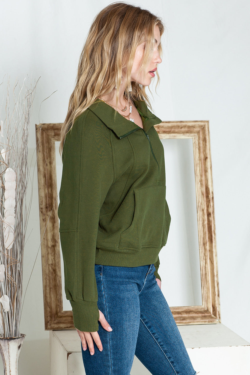 Brown zip-up sweatshirt with stand collar and thumbhole sleeves by Shewin, casual and comfortable for everyday wear.