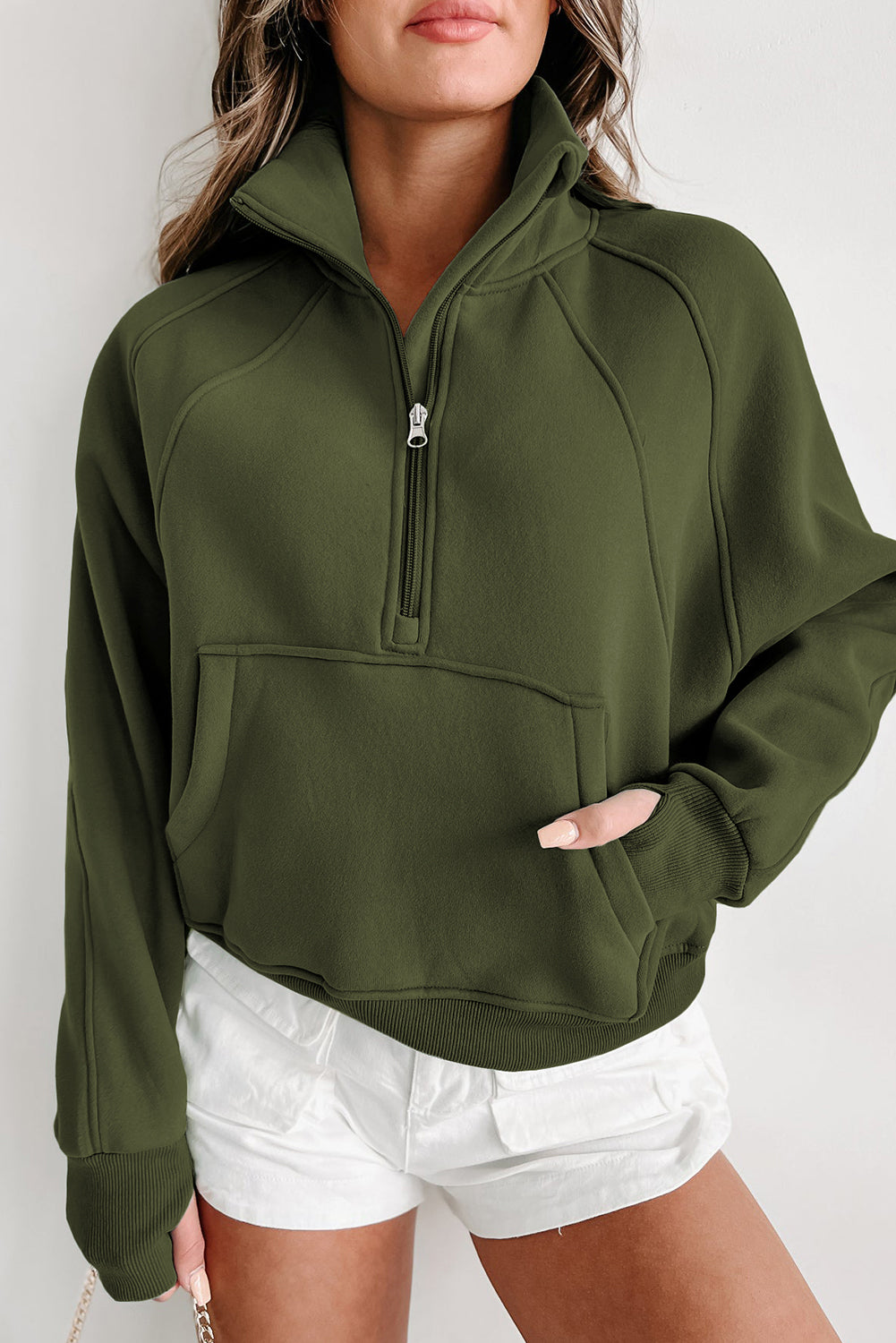 Brown zip-up sweatshirt with stand collar and thumbhole sleeves by Shewin, casual and comfortable for everyday wear.
