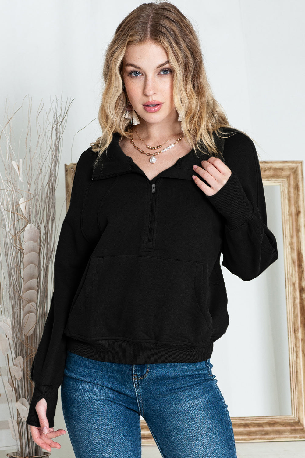 Brown zip-up sweatshirt with stand collar and thumbhole sleeves, casual Shewin hoodie for comfortable wear.