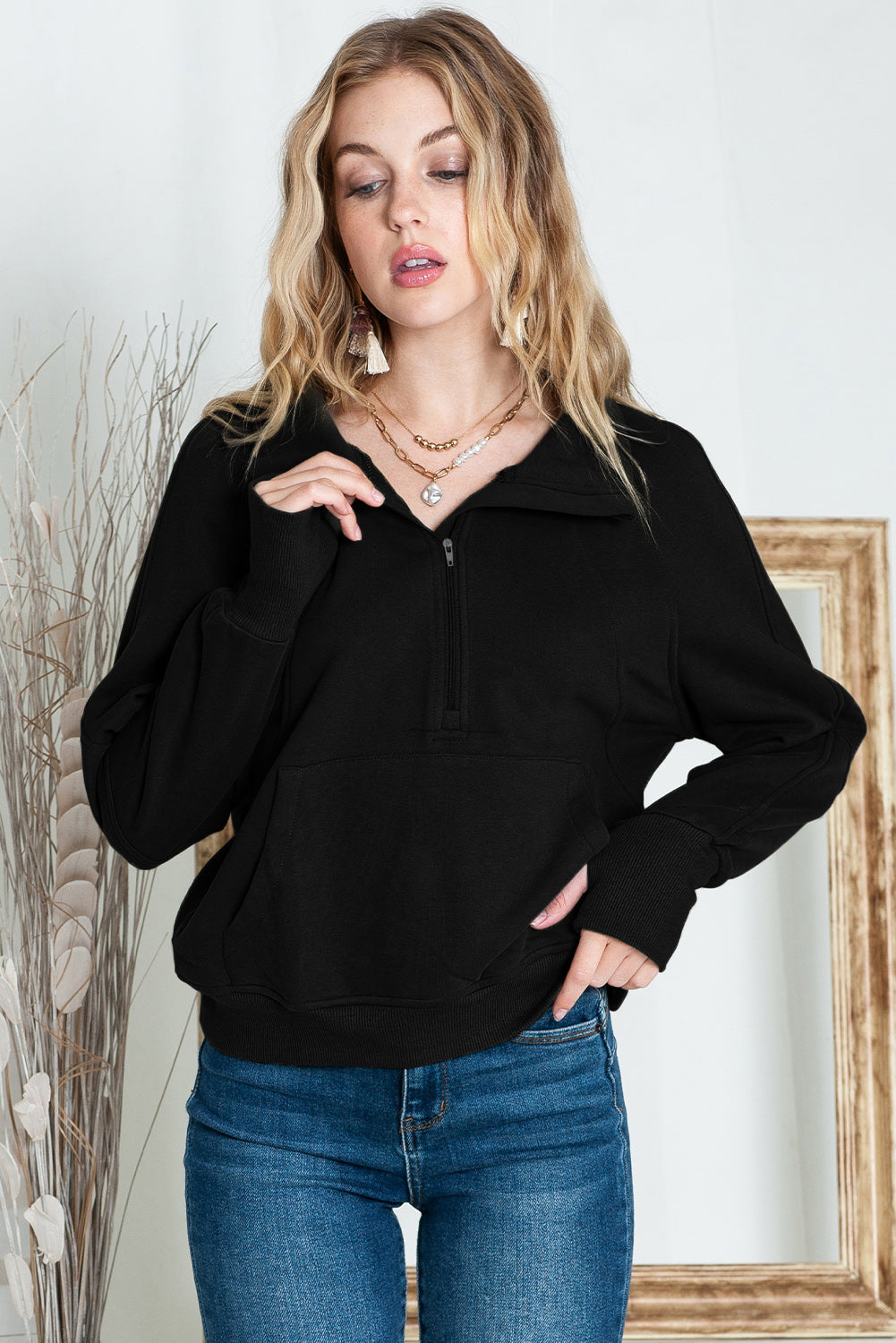 Brown zip-up sweatshirt with stand collar and thumbhole sleeves by Shewin, casual and comfortable for everyday wear.