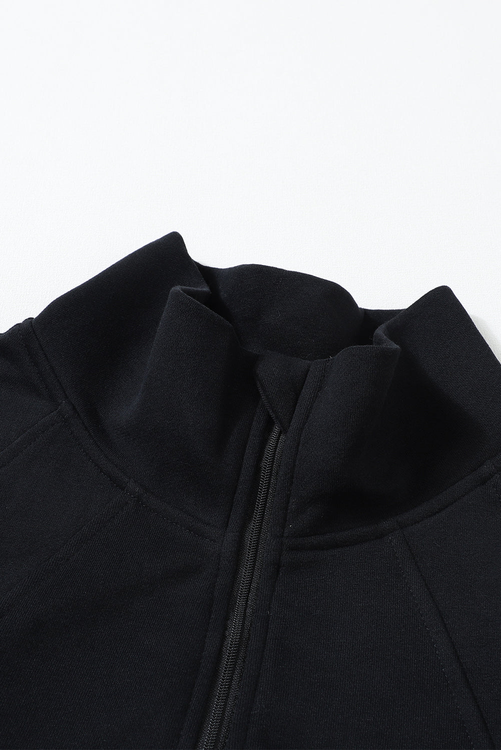 Brown zip-up sweatshirt with stand collar and thumbhole sleeves by Shewin, casual and comfortable for everyday wear.
