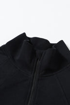 Brown zip-up sweatshirt with stand collar and thumbhole sleeves by Shewin, casual and comfortable for everyday wear.