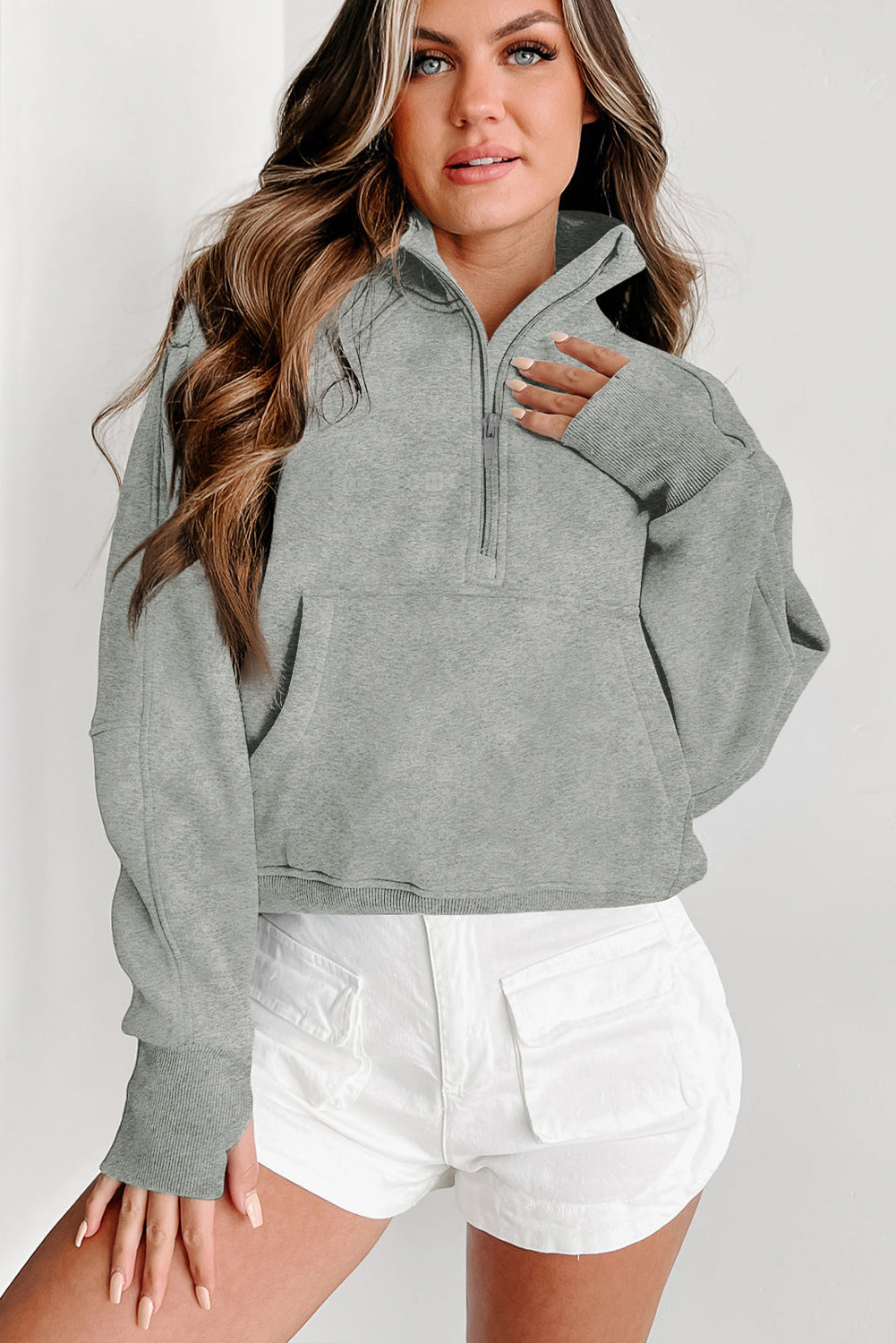 Brown zip-up sweatshirt with stand collar and thumbhole sleeves from Shewin, casual hoodie for comfortable style.