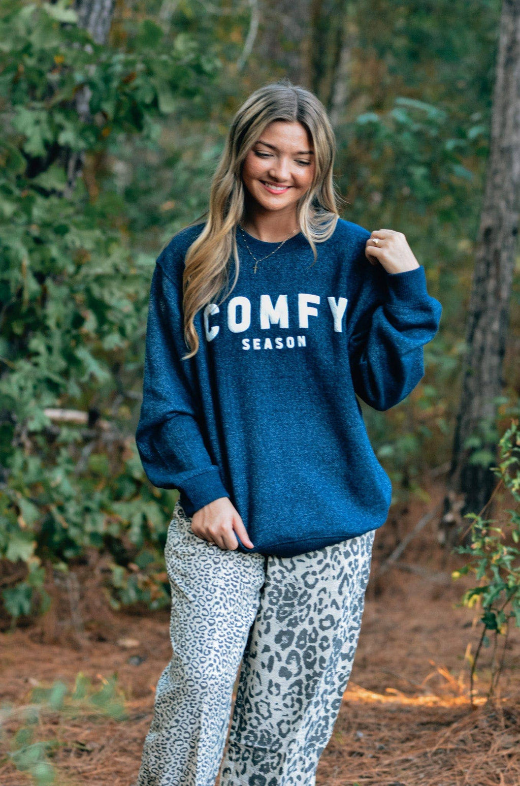 Soft gray Comfy Season Knit Sweatshirt by Southern Bliss Co. featuring a cozy, relaxed fit and ribbed cuffs for casual comfort.