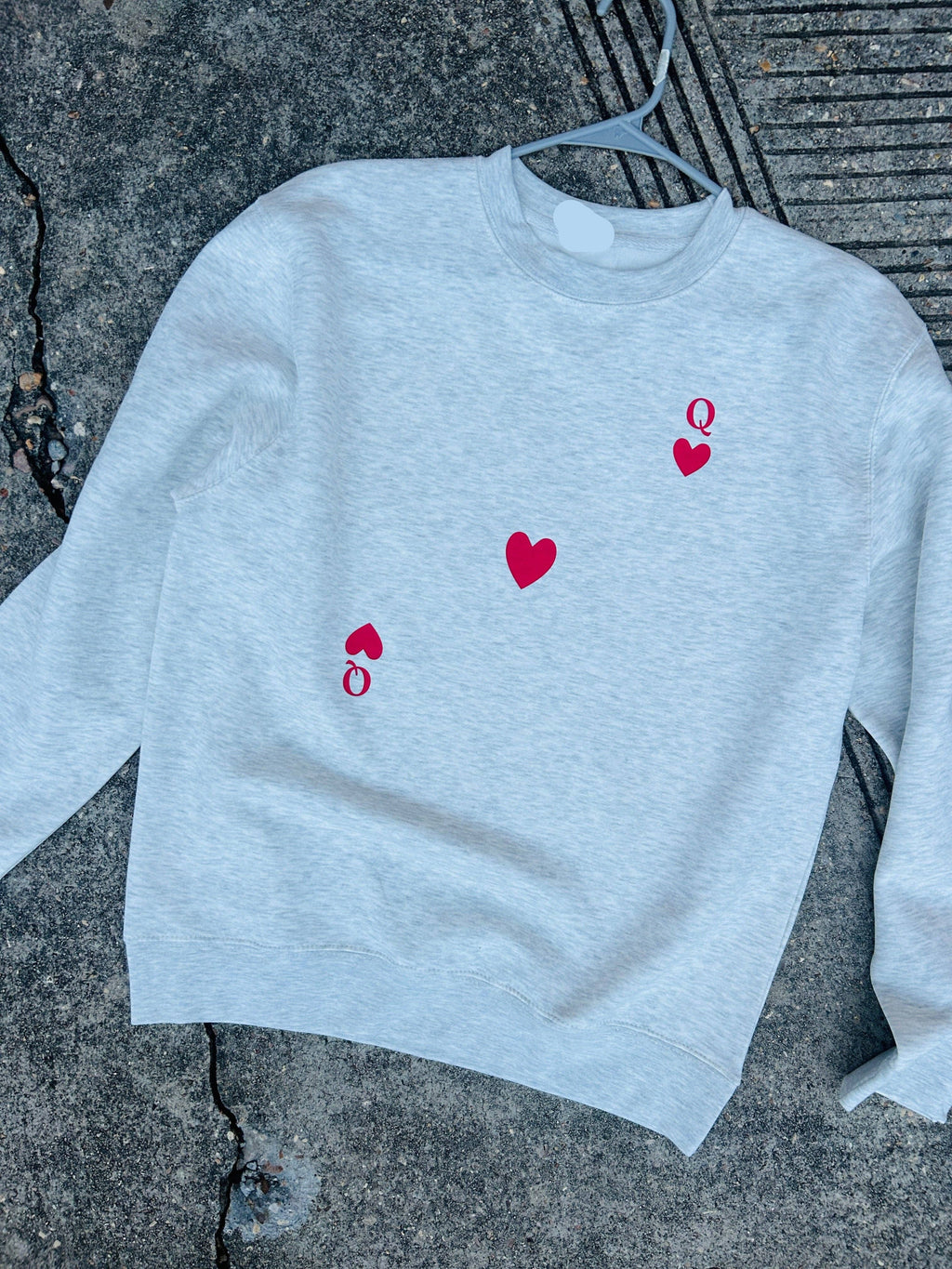 Southern Bliss Co. Queen Card sweatshirt featuring a comfortable fit with a stylish queen card design on soft fabric.