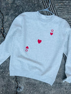 Southern Bliss Co. Queen Card sweatshirt featuring a comfortable fit with a stylish queen card design on soft fabric.