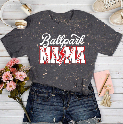 Southern Bliss Co. Ballpark Mama bleached T-shirt with a relaxed fit, featuring a distressed ballpark design on soft cotton fabric.