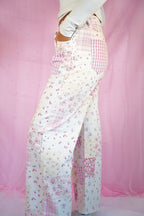 Pink floral and gingham patchwork jeans by Starstruckd, featuring a stylish mix of patterns and casual denim fit.
