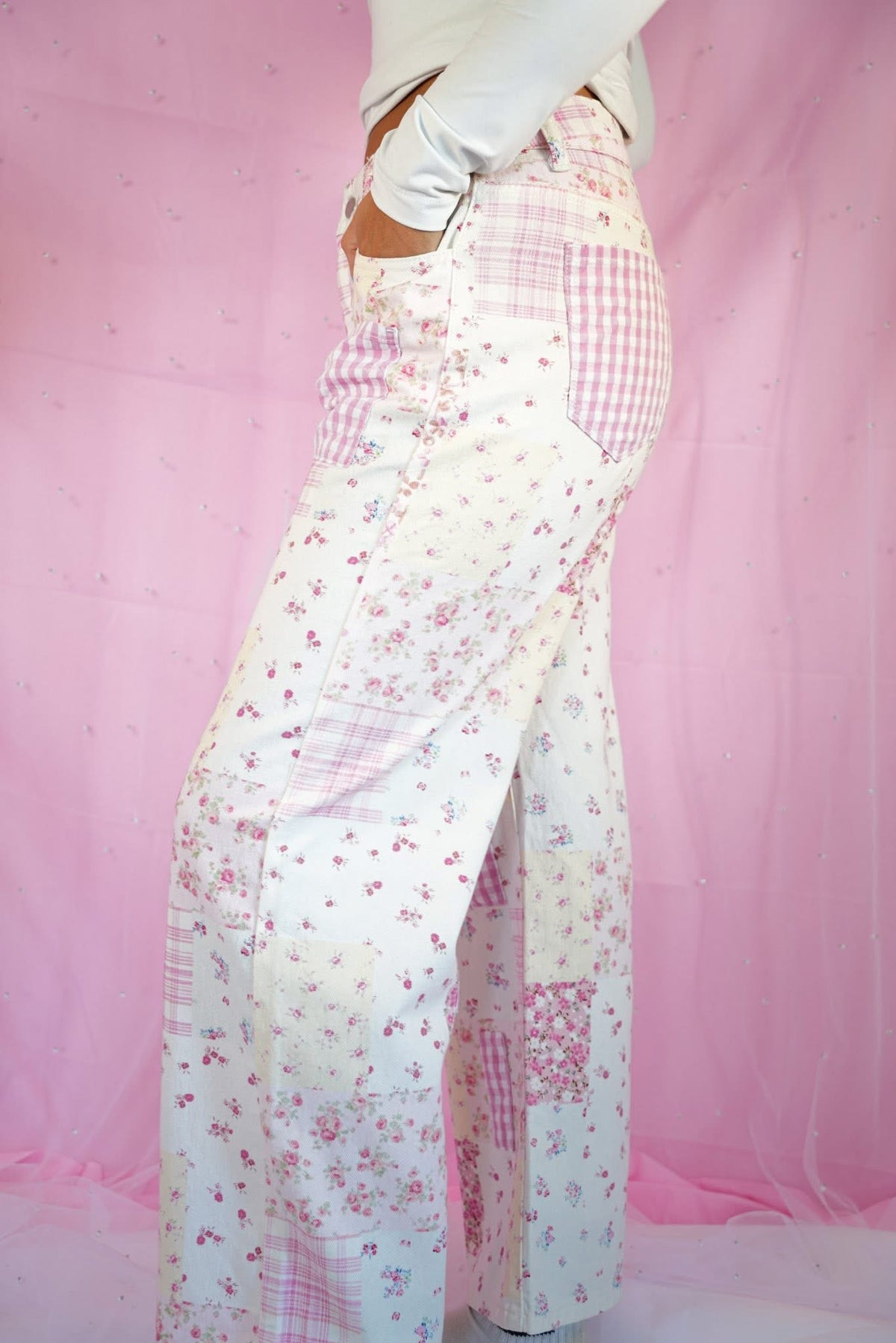 Pink floral and gingham patchwork jeans by Starstruckd, featuring a stylish mix of patterns and casual denim fit.