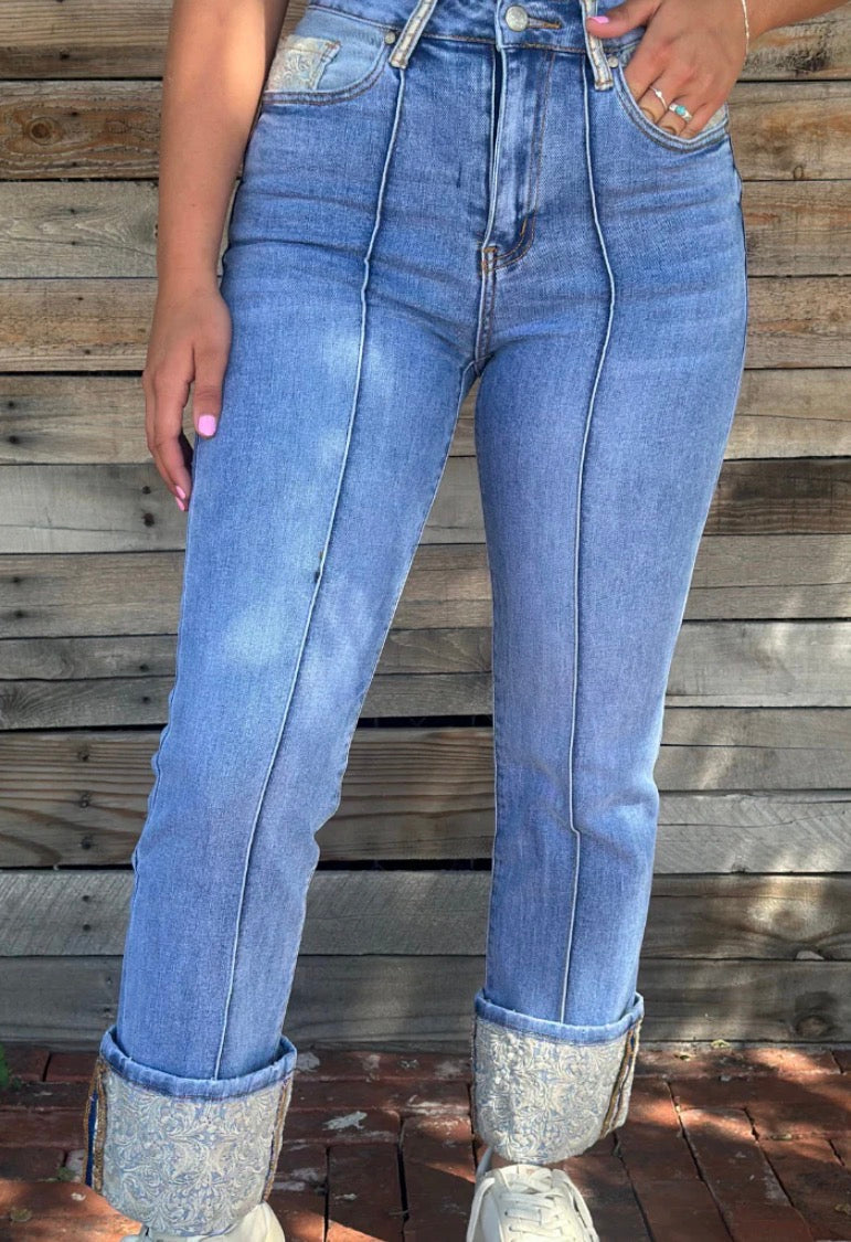Sterling Kreek embroidered cuffed jeans with detailed stitching, relaxed fit, and classic denim look.