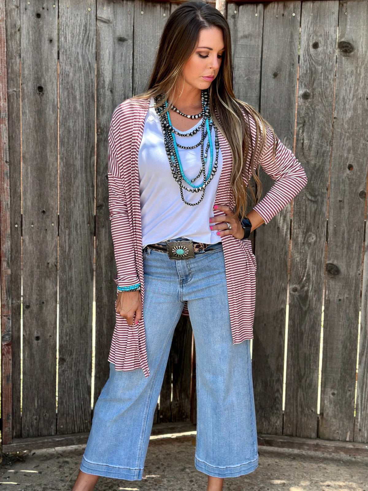 Mauve striped mid-length cardigan sweater by Texas True Threads, featuring soft knit fabric and casual, stylish design.