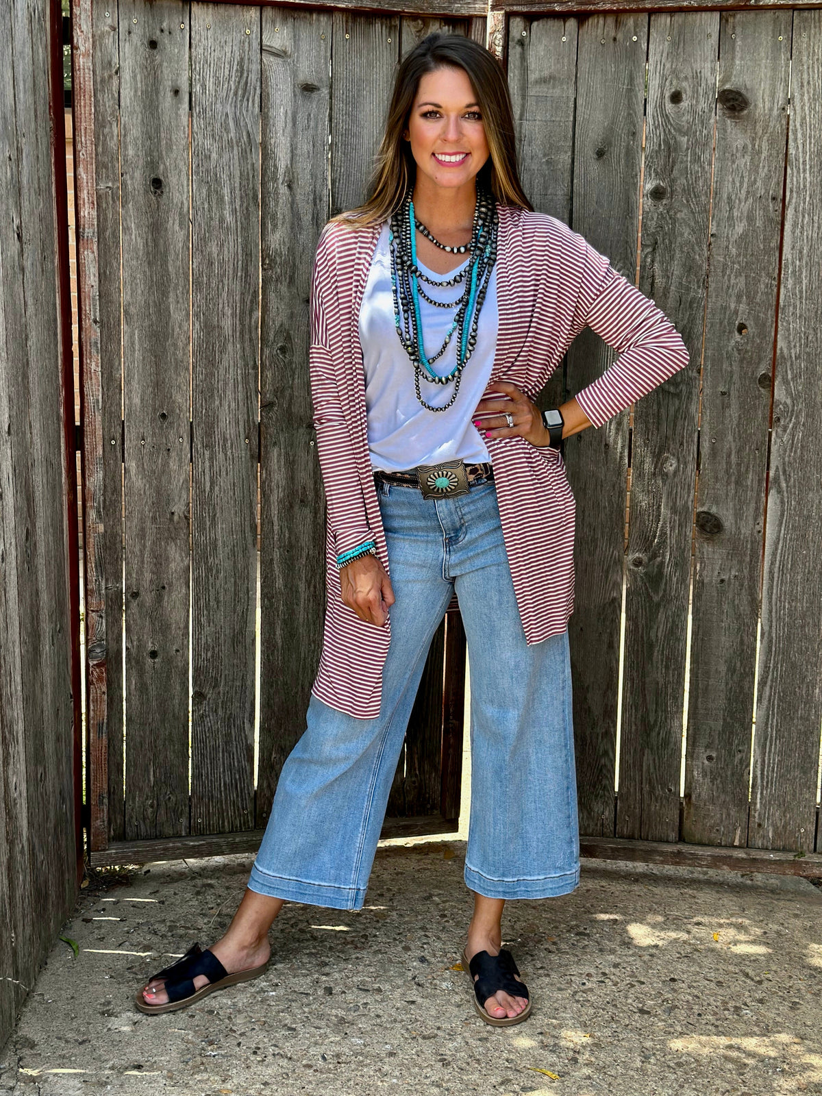 Mauve striped mid-length cardigan sweater by Texas True Threads, featuring a cozy knit with vertical stripe pattern.