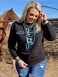 Black crewneck tee from Texas True Threads featuring a teal metallic puff print with the phrase "Faith in Teal."