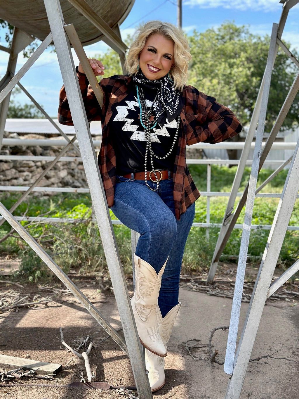 Black Durango Aztec V-neck tee by Texas True Threads, featuring a stylish Aztec pattern and a comfortable V-neck silhouette.