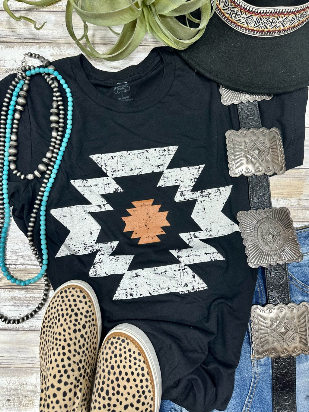 Black Durango Aztec V-neck Tee by Texas True Threads, soft cotton shirt with Aztec pattern design.
